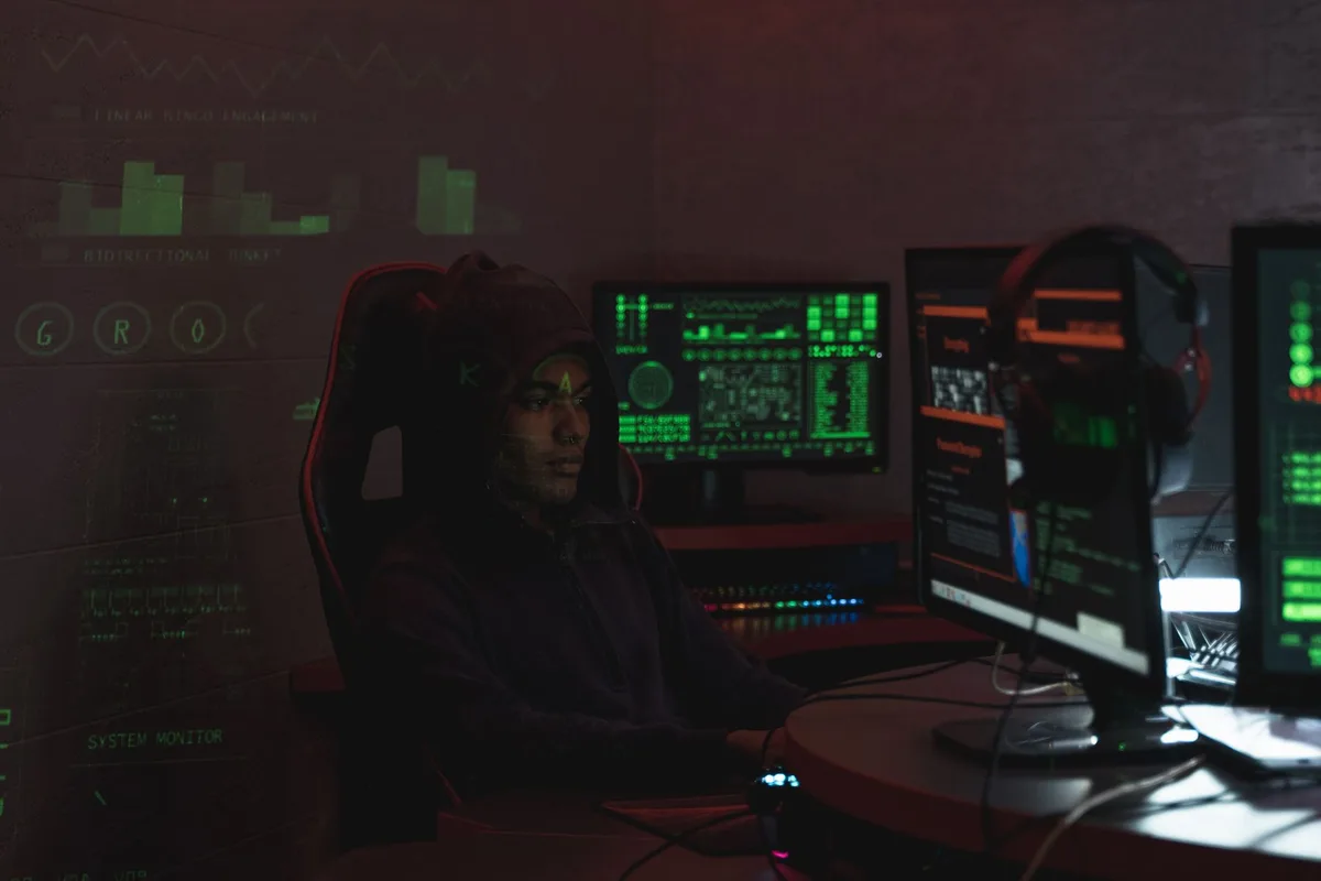 Cybersecurity concept showing locked digital shield over fragmented face representation, abstract data visualization, protection against identity theft