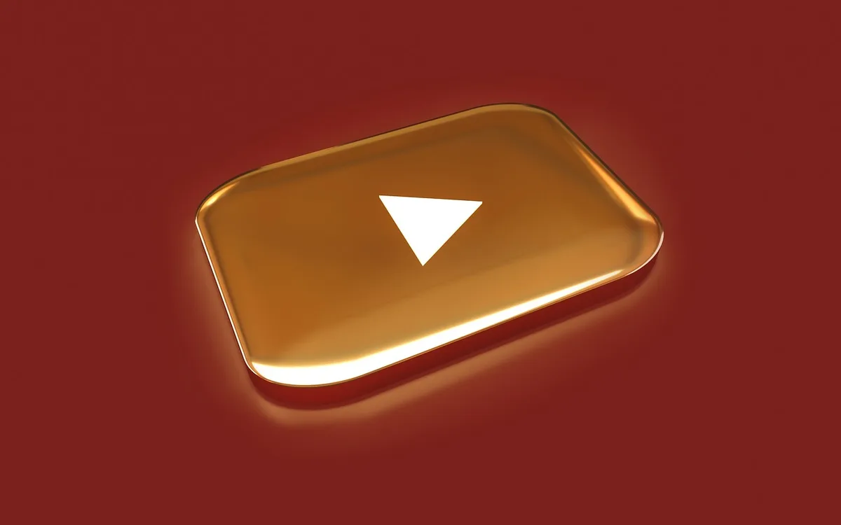 Streaming platform interface displaying series titles and promotional artwork, soft lighting on a dark screen