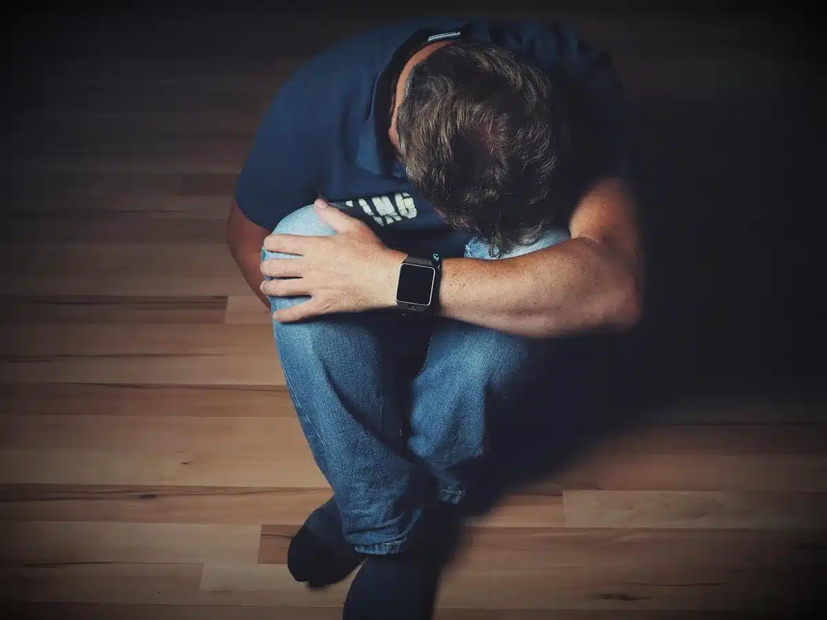 Ulisses facing consequences in empty room, rejected and isolated