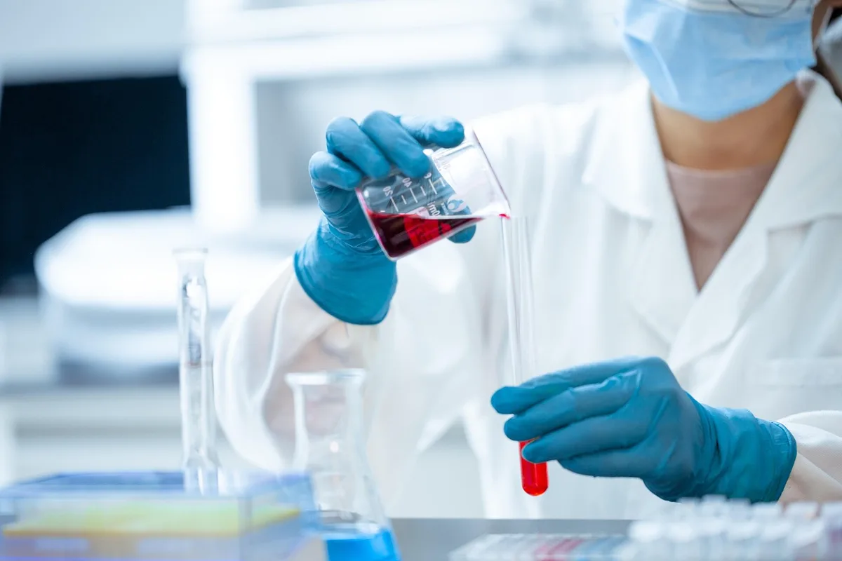 A sleek technology laboratory with multiple screens displaying complex data visualizations and AI model architectures, illuminated by soft blue and white light, representing cutting-edge AI research and development